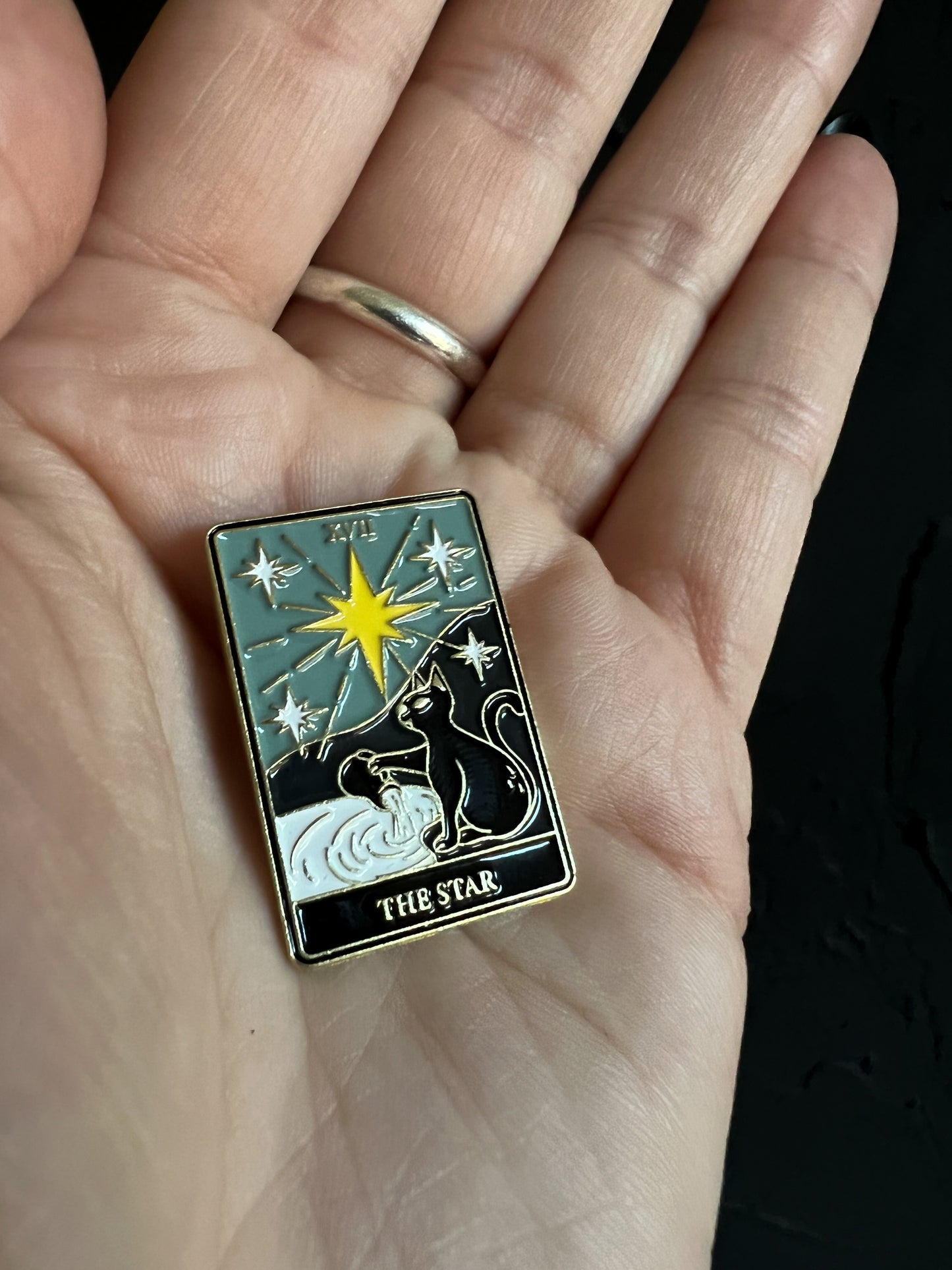 The Star Tarot Card Enamel Pin featuring a black cat!