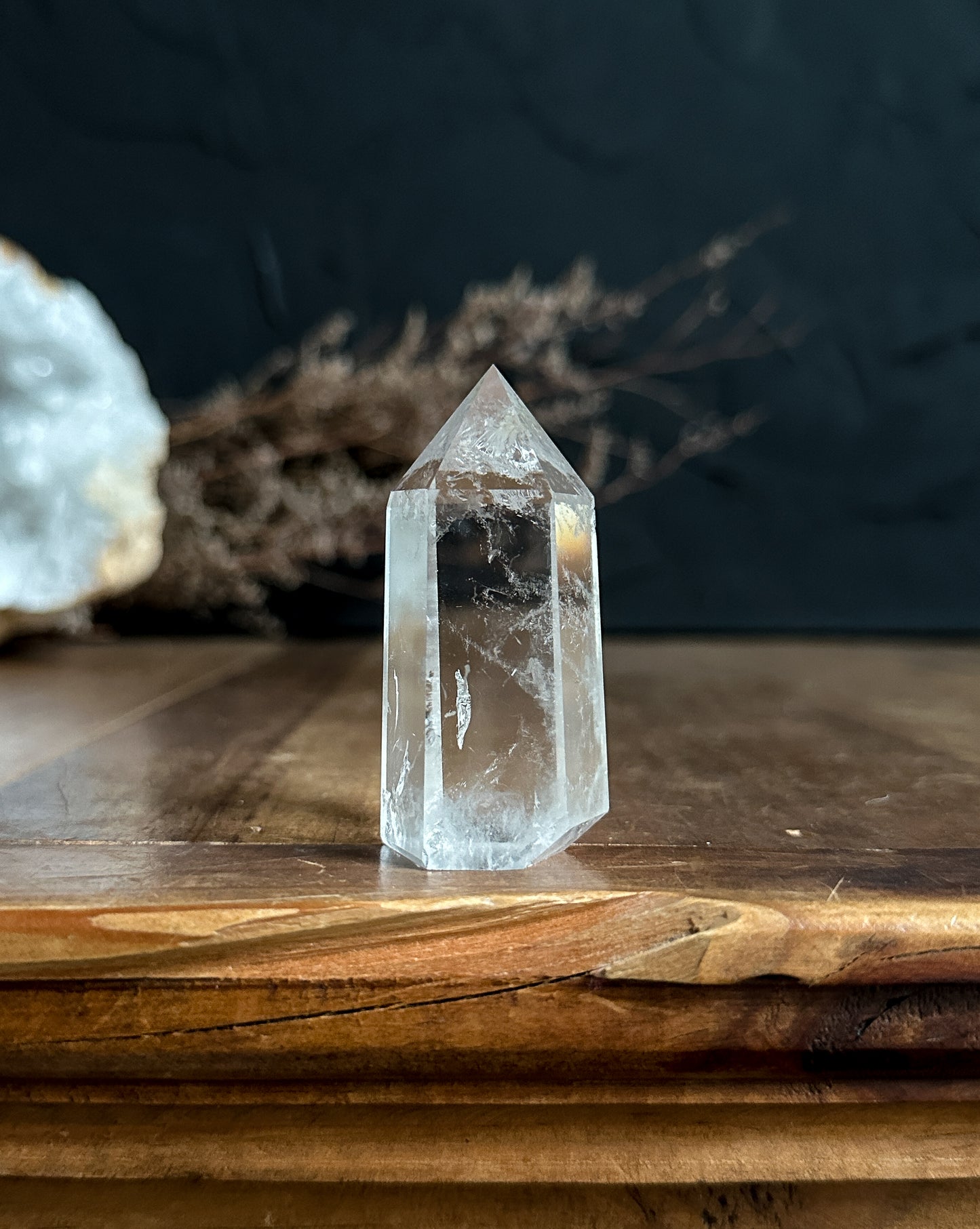 gorgeous crystal clear quartz tower sold at The Stone Maidens. Perfect for a crystal grid or used as a crystal wand.