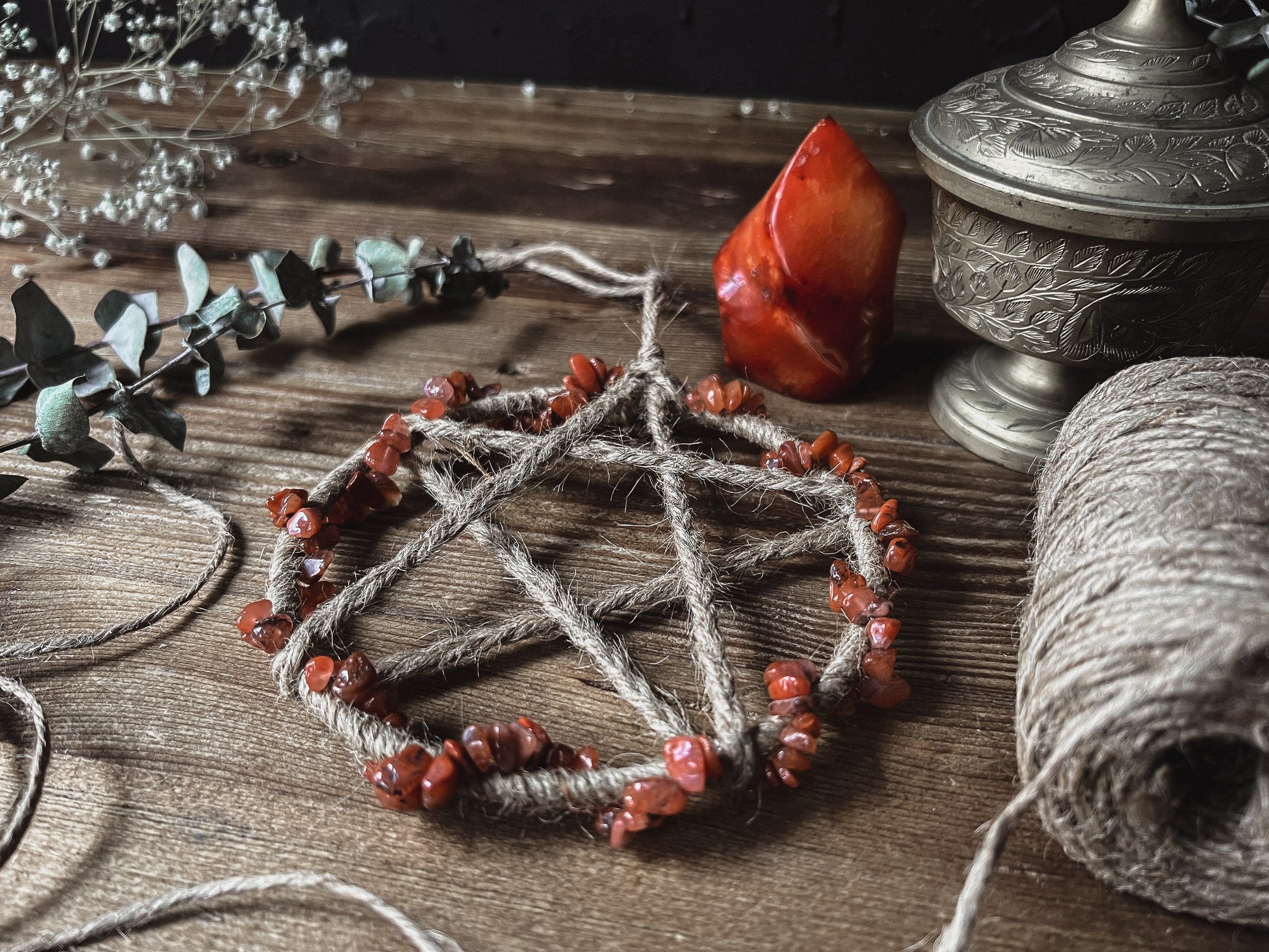 handcrafted Red Carnelian Crystal Pentacle Wall Hanging for your witch altar, sacred space or home decor. 