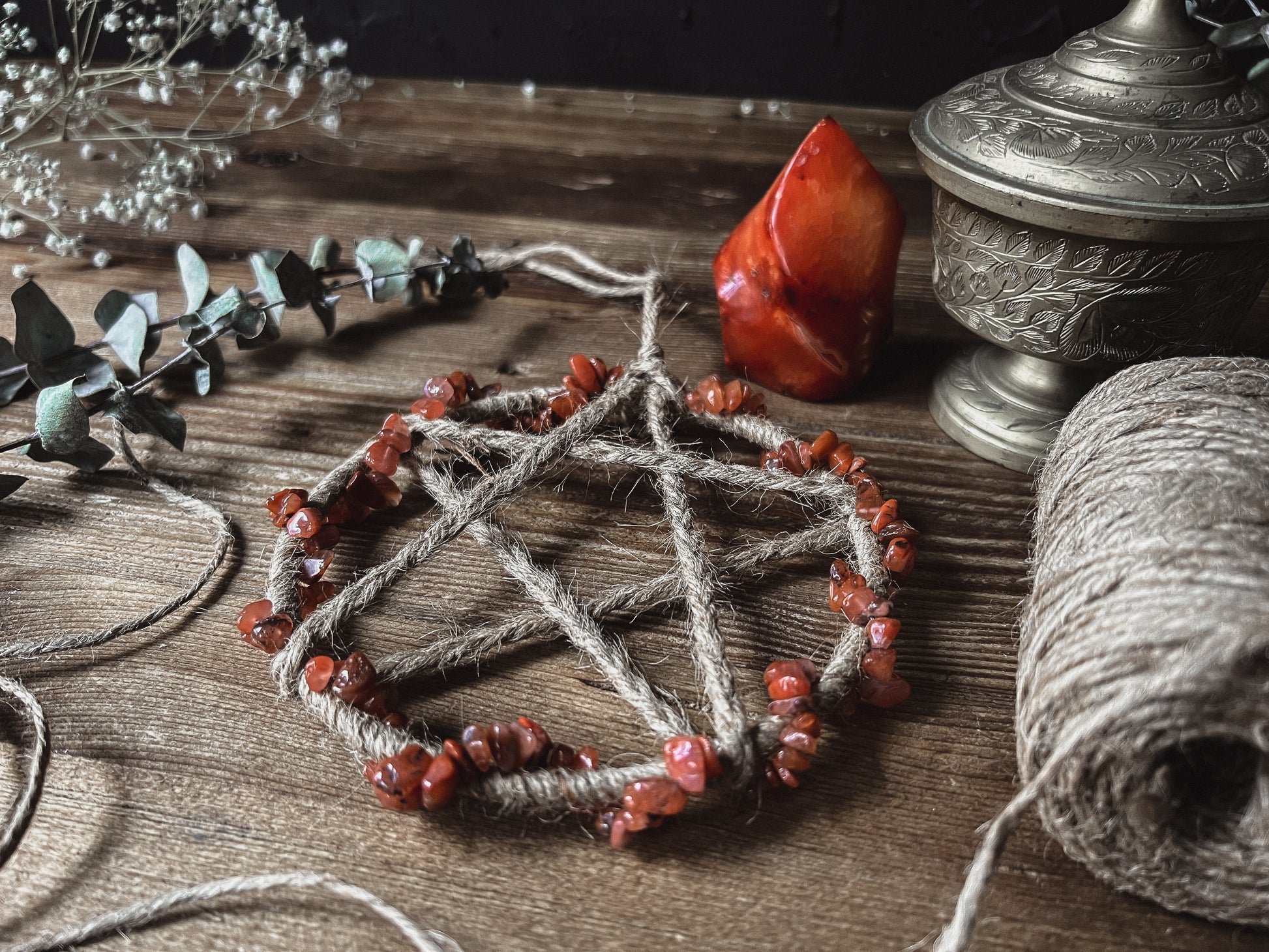 handcrafted Red Carnelian Crystal Pentacle Wall Hanging for your witch altar, sacred space or home decor.