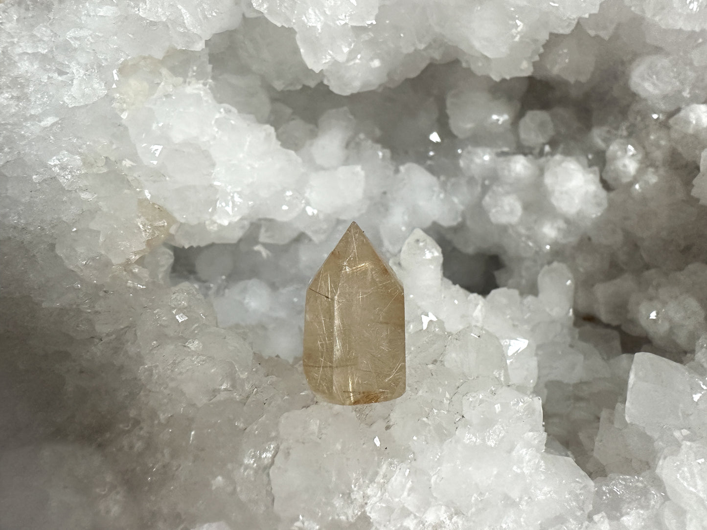 This mini Golden Rutilated Quartz tower is small but mighty!