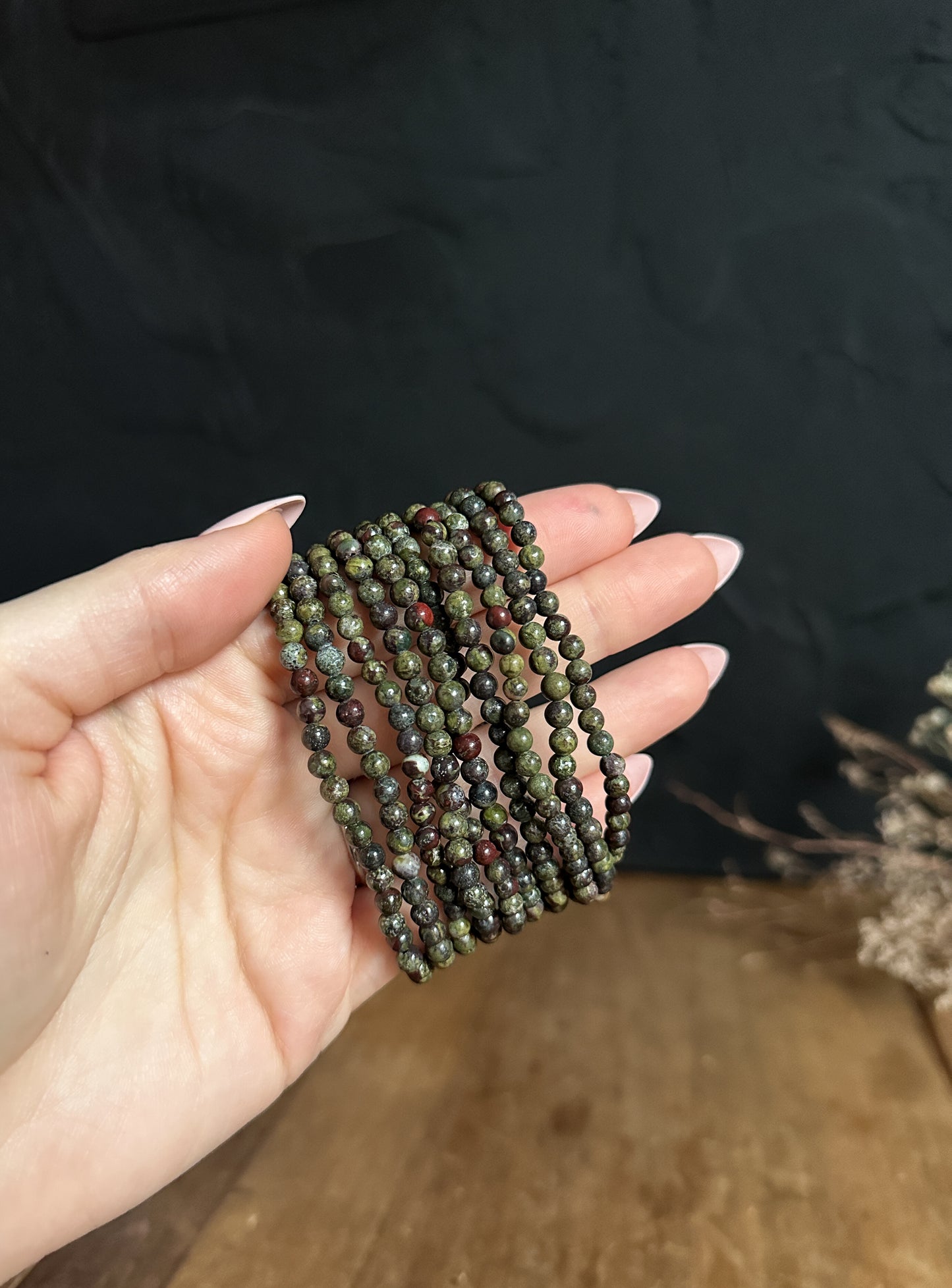 a close up shot of 4mm Dragons Blood Jasper Bracelets at The Stone Maidens. 