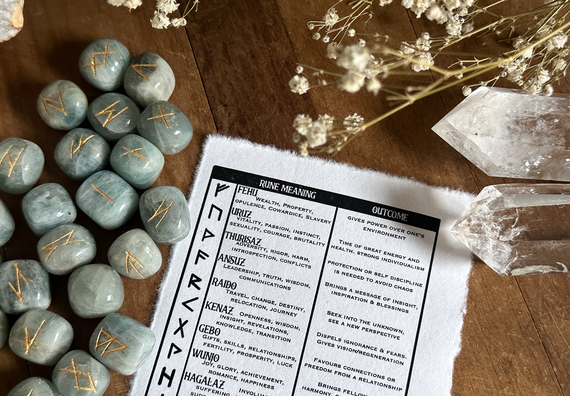 The Stone Maidens image featuring various metaphysical tools, including crystals and runes, perfect for enhancing meditation, divination, and energy work.