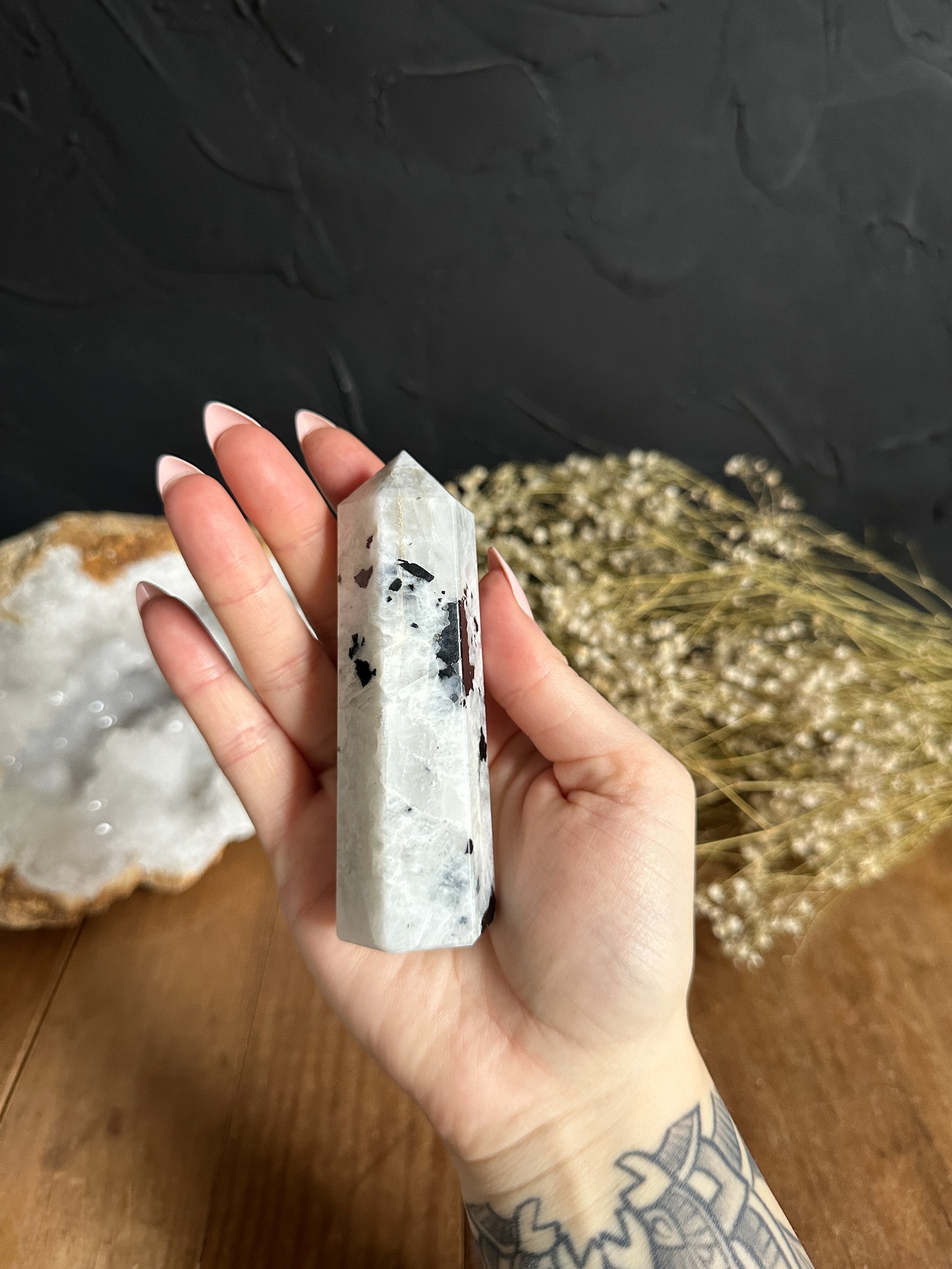 Rainbow Moonstone Tower. This beautiful piece is perfect for crystal healing, meditation, and enhancing intuition. Its serene energy promotes emotional balance and inner peace. Whether you're a collector or seeking holistic wellness, our moonstone tower is a stunning addition to any crystal collection