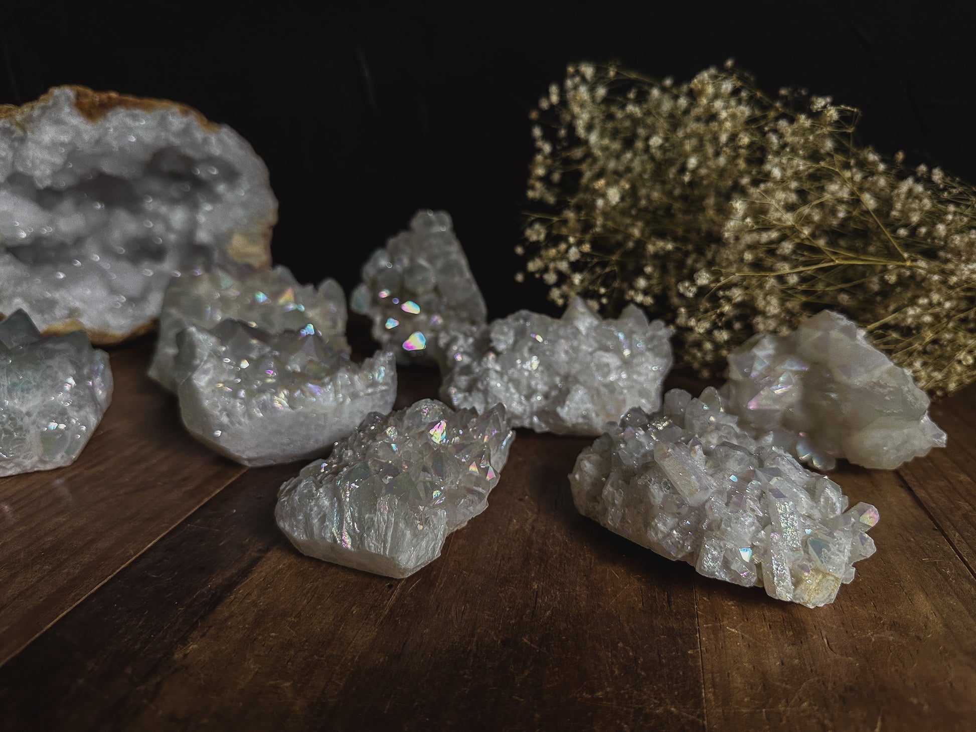 Angel Aura Quartz Clusters for your crystal collection are sold at The Stone Maidens