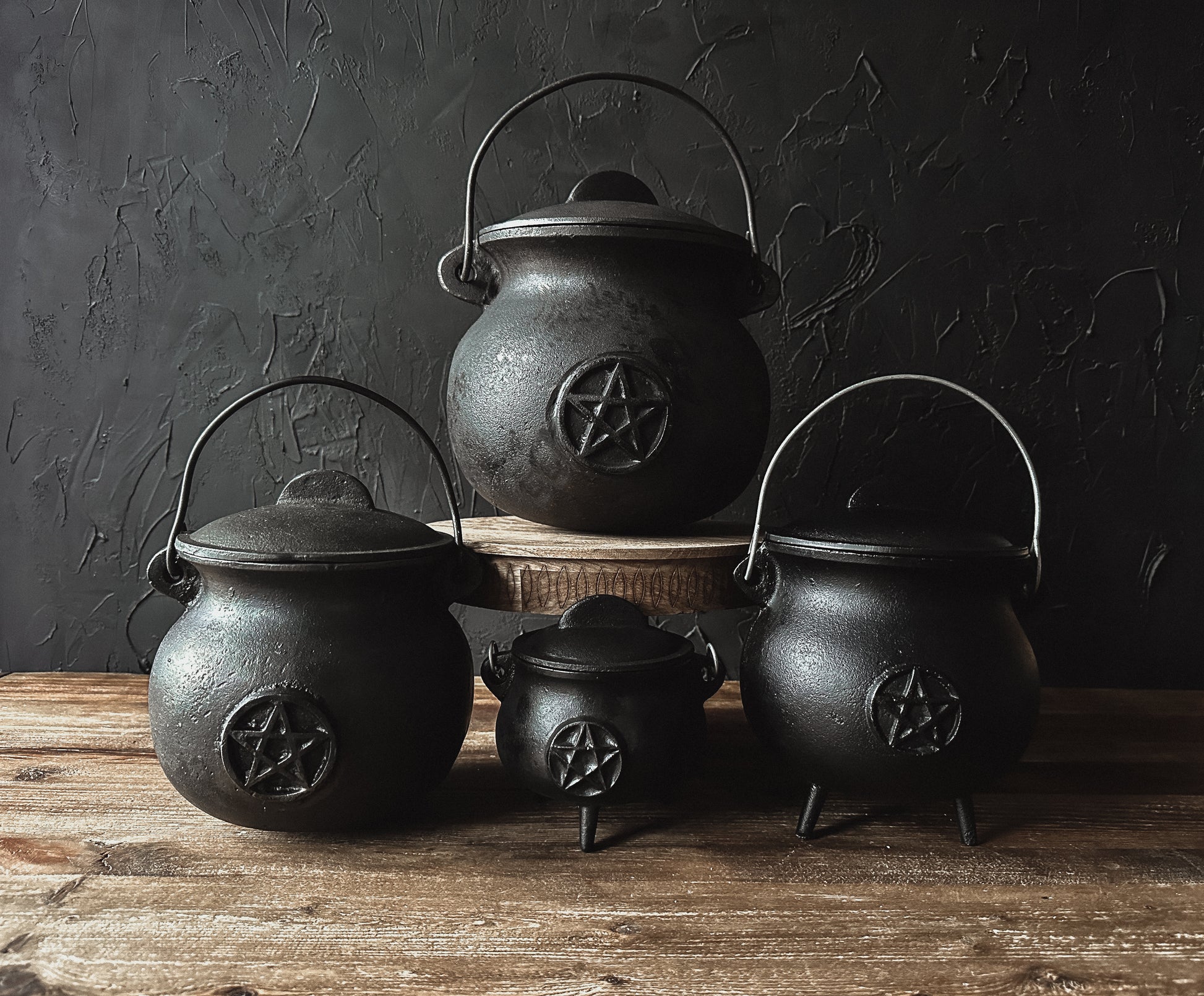 High-quality image showcasing  black cast iron cauldrons sold at The Stone Maidens. Ideal for brewing potions, burning herbs, and embracing your inner witchy vibes.