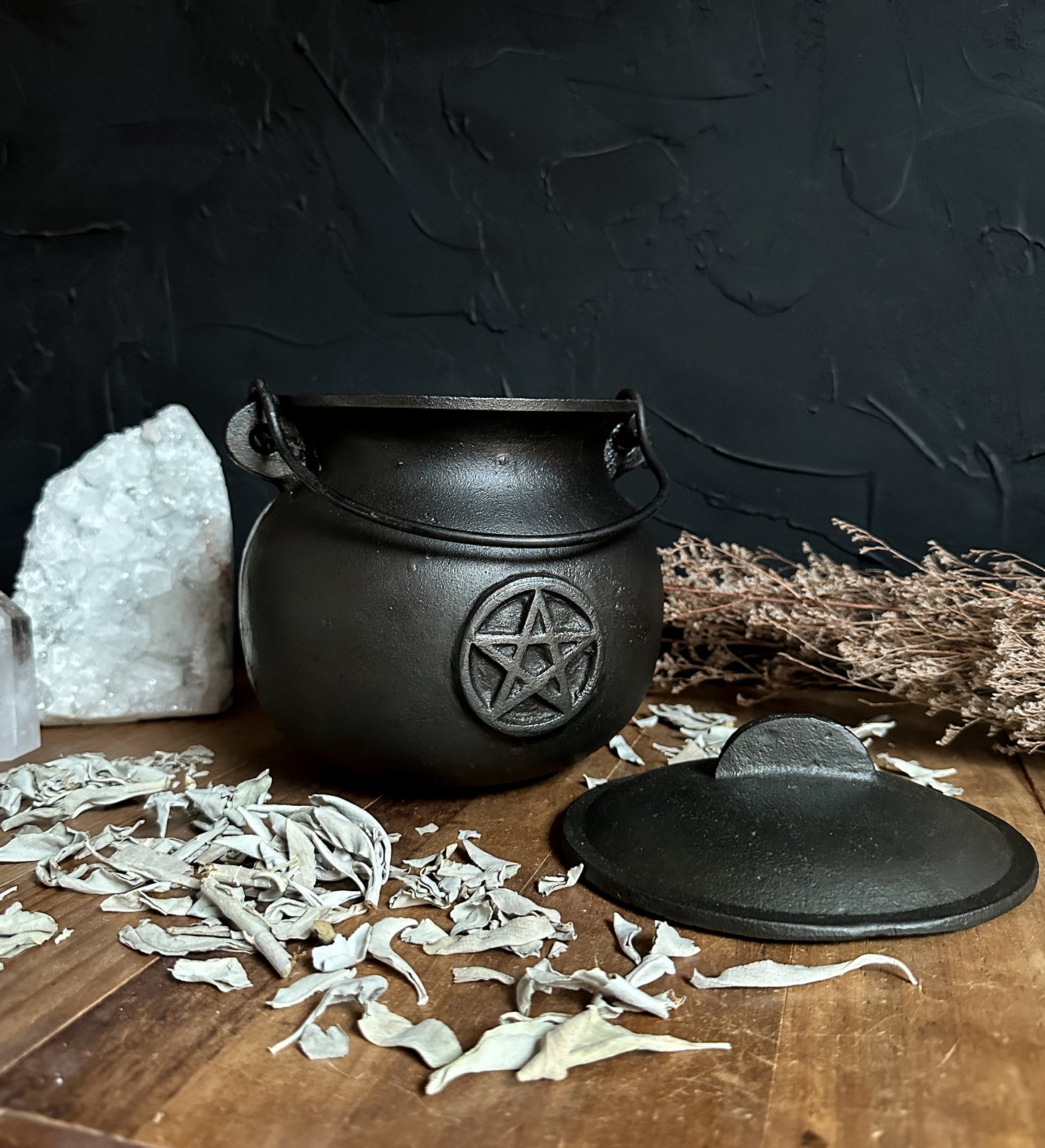 A large black cast iron cauldron, perfect for rituals, incense burning, and adding a touch of magic to your space. Witch Altar must have!