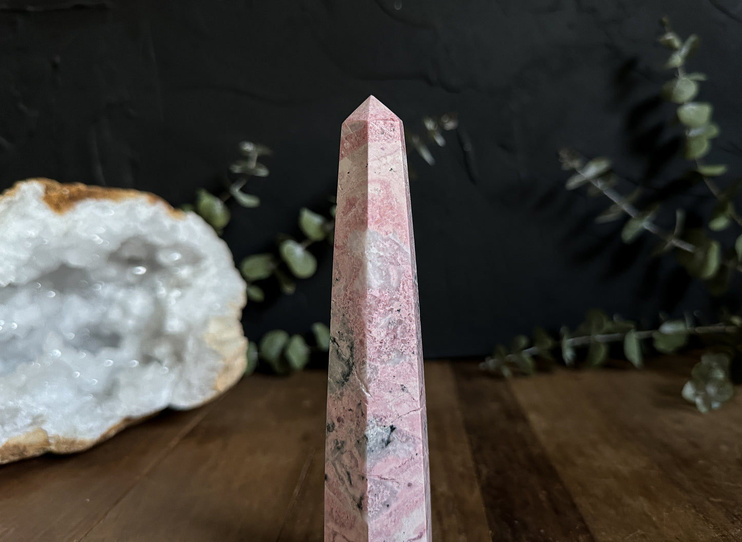 Rhodonite, a crystal of compassion and emotional healing, aligns with the heart chakra.