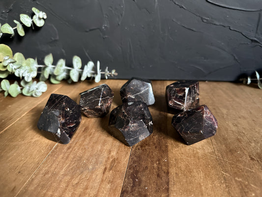 You will receive one Garnet Freeform Tumbled Stone. A Crystal for Passion, Energizing, Wellness and Protection!