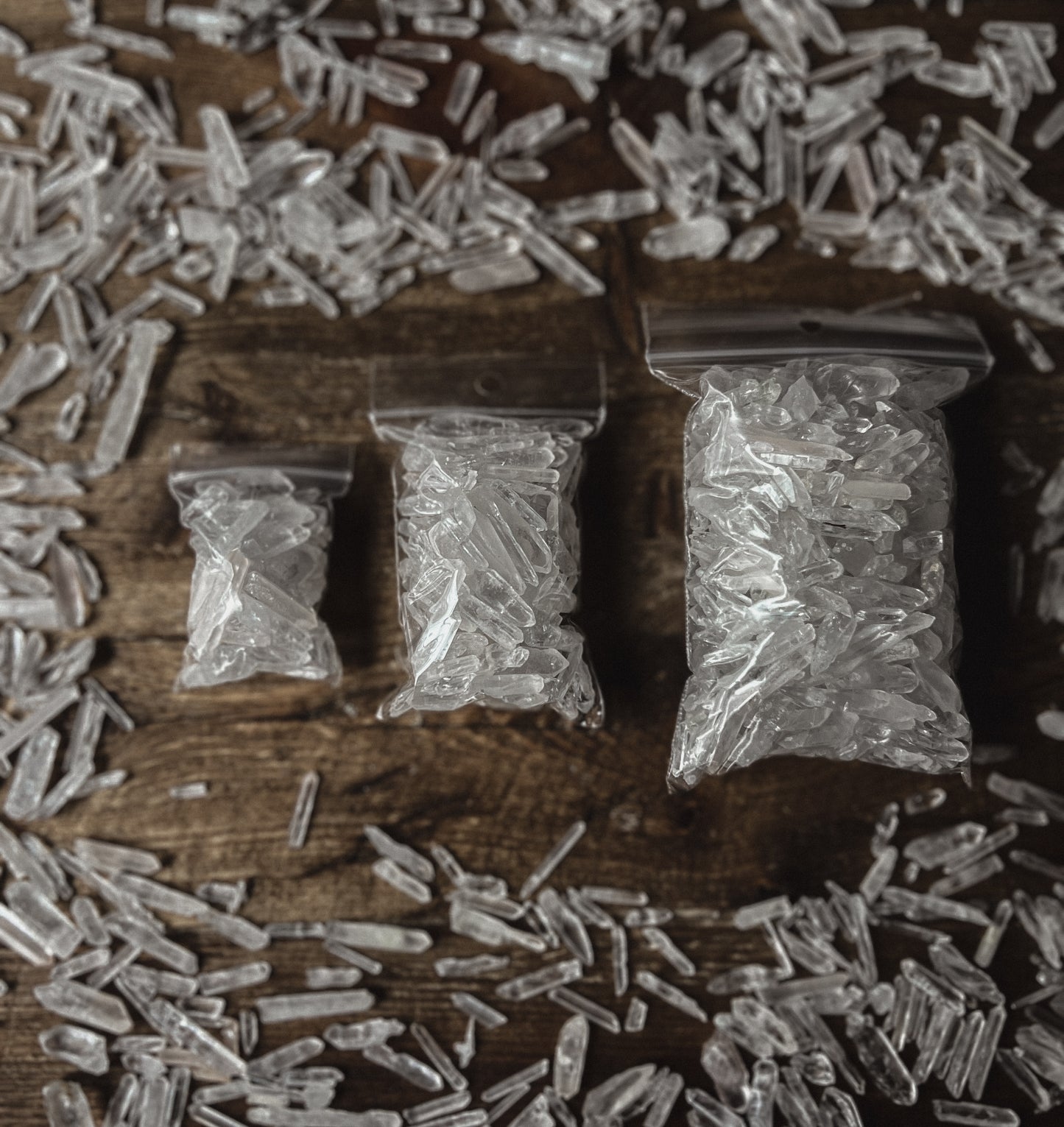 These bags are filled with Clear Quartz Crystal points and chunks.