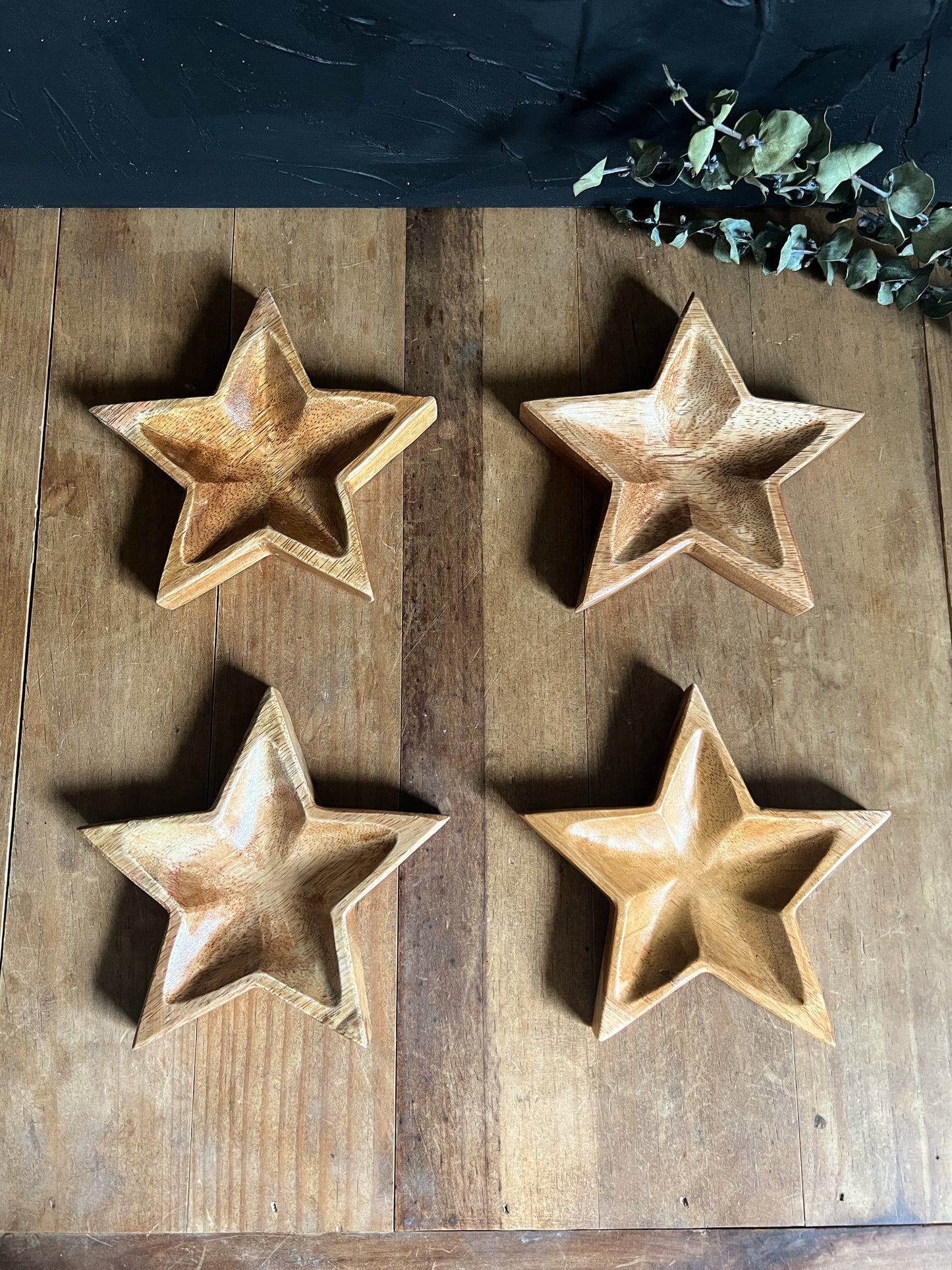 Wooden star-shaped dish perfect for holding small items like jewelry and crystals.