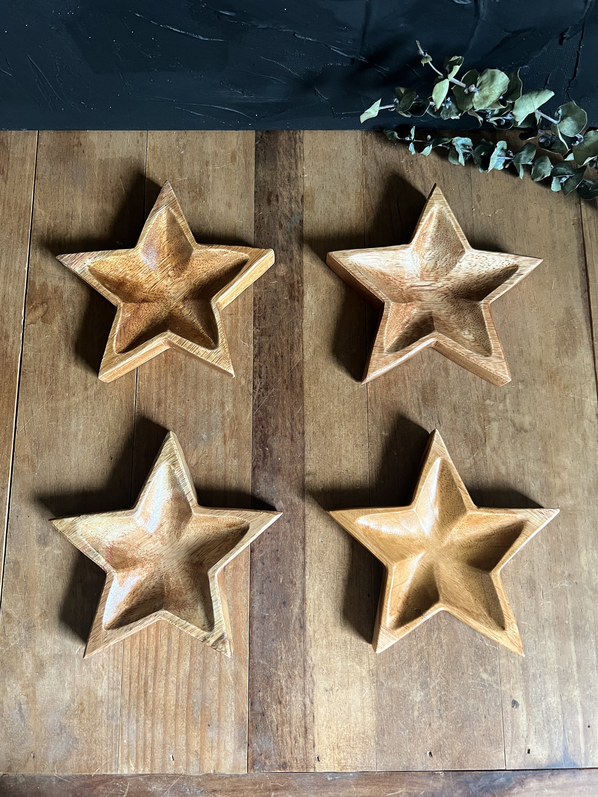 Wooden star-shaped dish perfect for holding small items like jewelry and crystals.