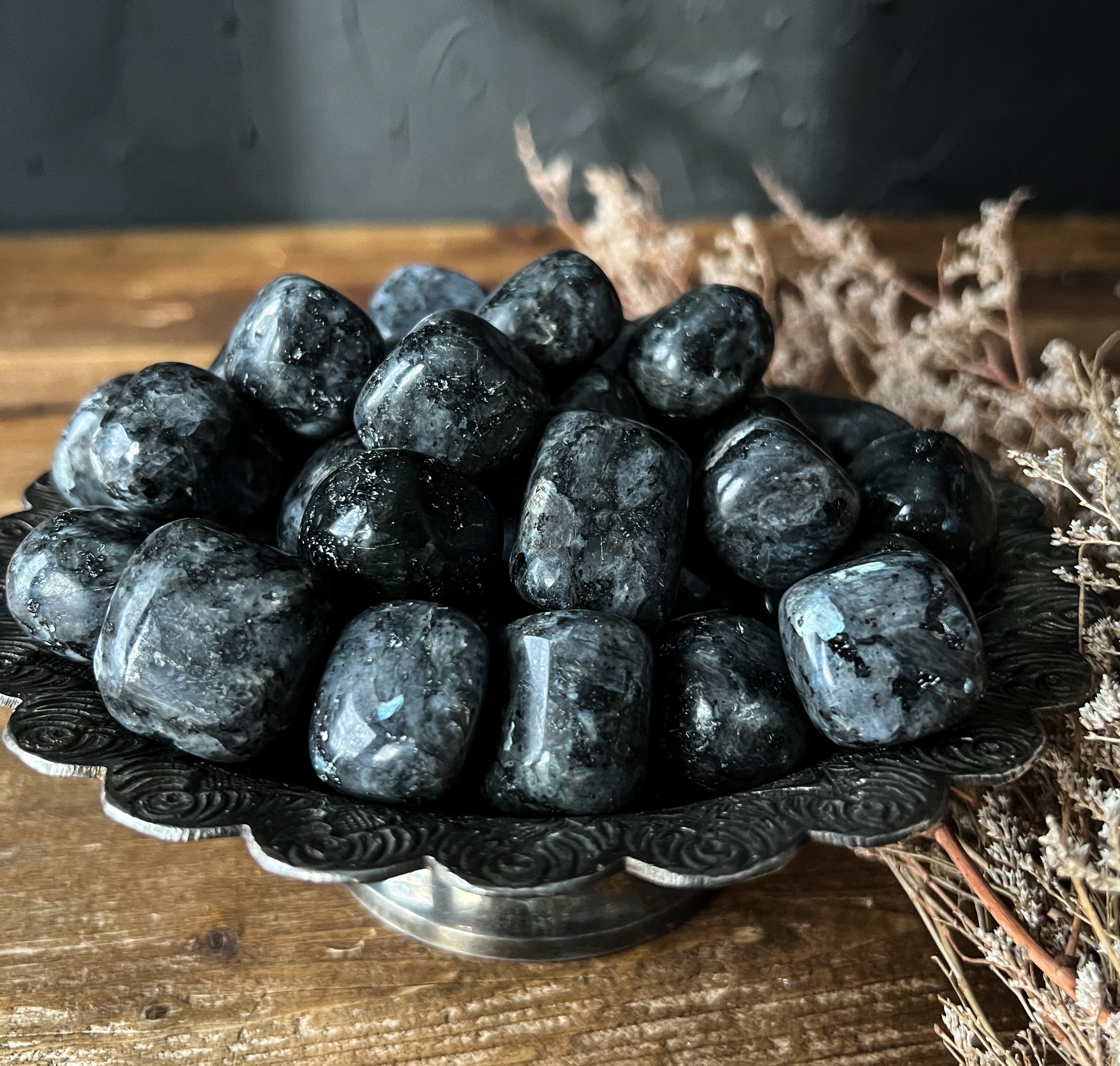 Larvikite is a protective and grounding stone. Tumbled Larvikite Stones at The Stone Maidens.