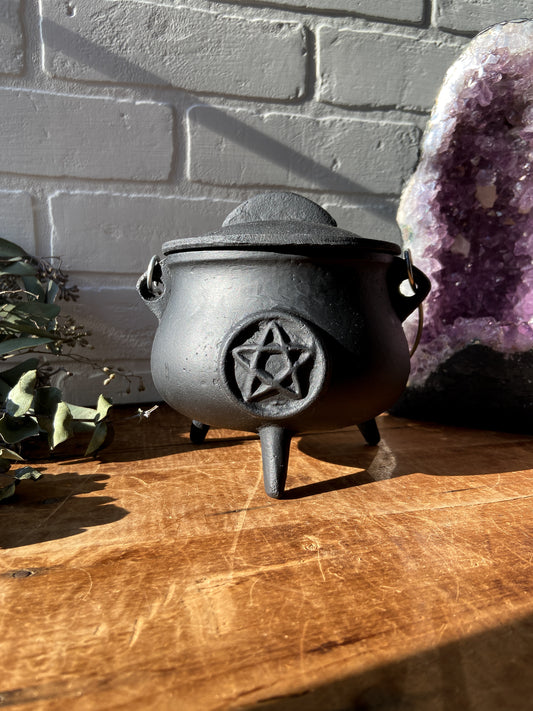 This Pentacle Cast Iron Cauldron can be used for offerings, burning incense, as a candle holder or anything your heart desires.