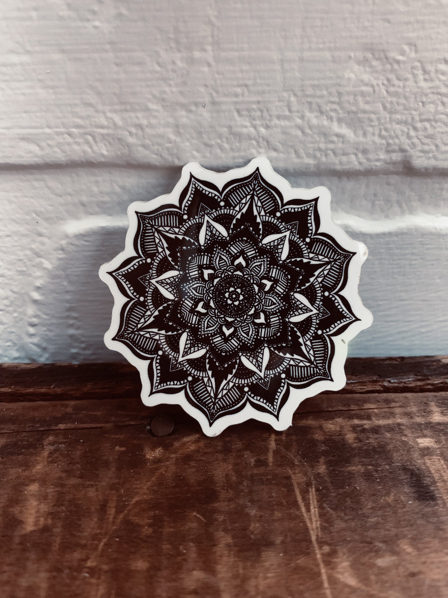 A mesmerizing black and white Mandala sticker.