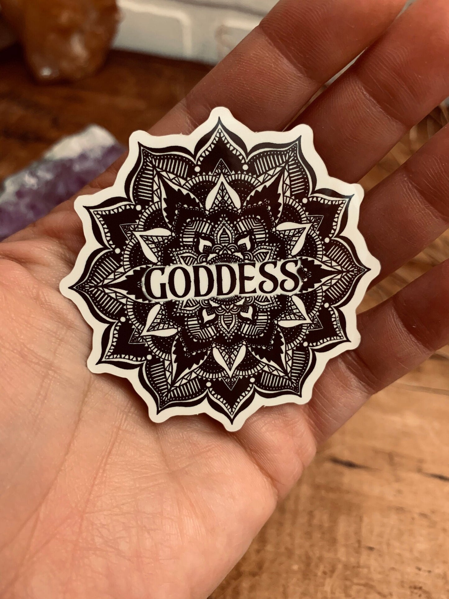 A black and white Mandala  with the word Goddess in the center Sticker