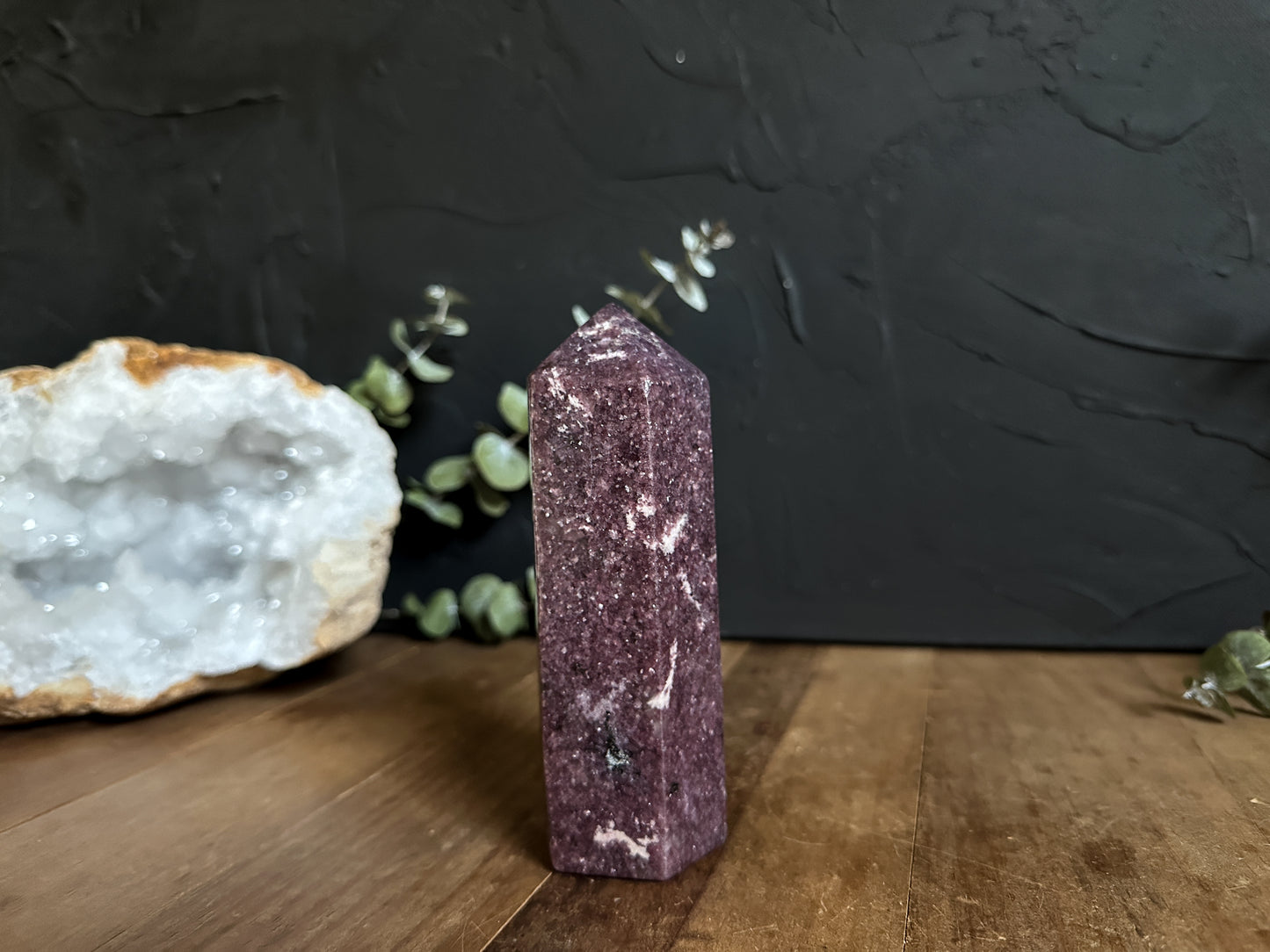 Infused with the calming energy of Lepidolite, this tower serves as a powerful ally in promoting relaxation and emotional balance