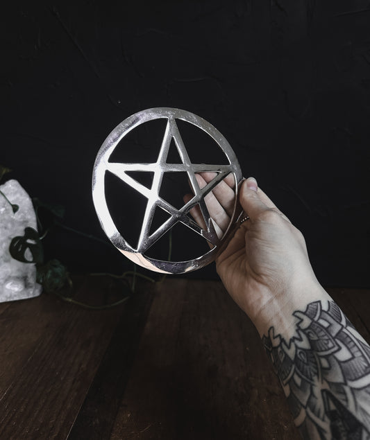 Silver Pentacle,  Earth, Air, Fire, Water, and Spirit – harmoniously interconnected to channel divine energy.