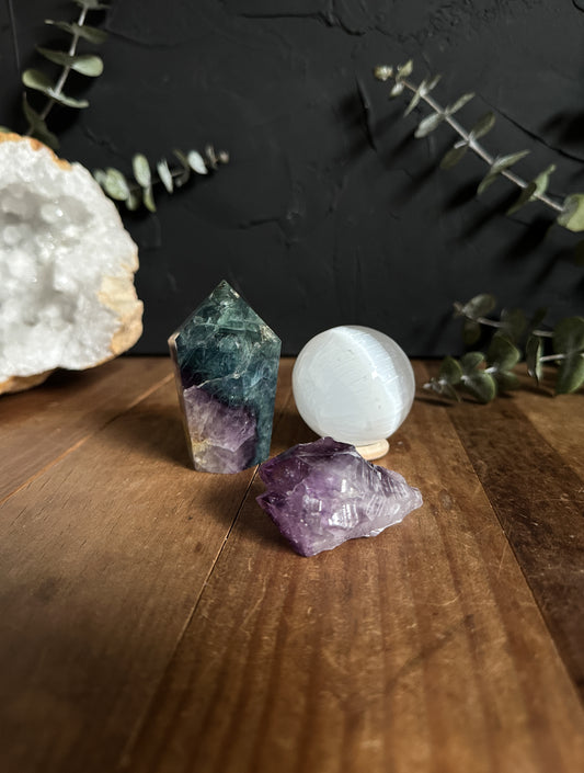 Enhance your focus with our Crystal Focus Kit, featuring three powerful stones: Amethyst, Fluorite, and Selenite.