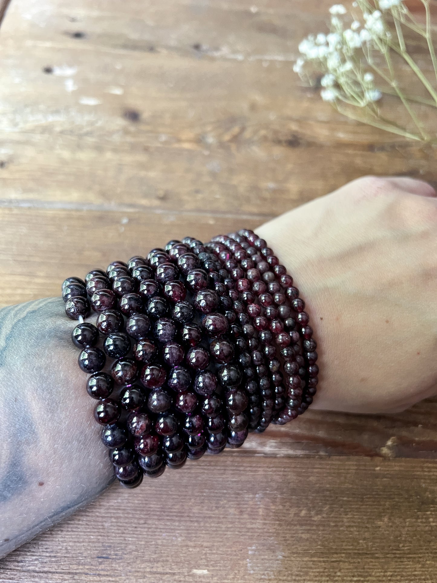 a close up shot of 4mm Garnet Bracelets at The Stone Maidens. 