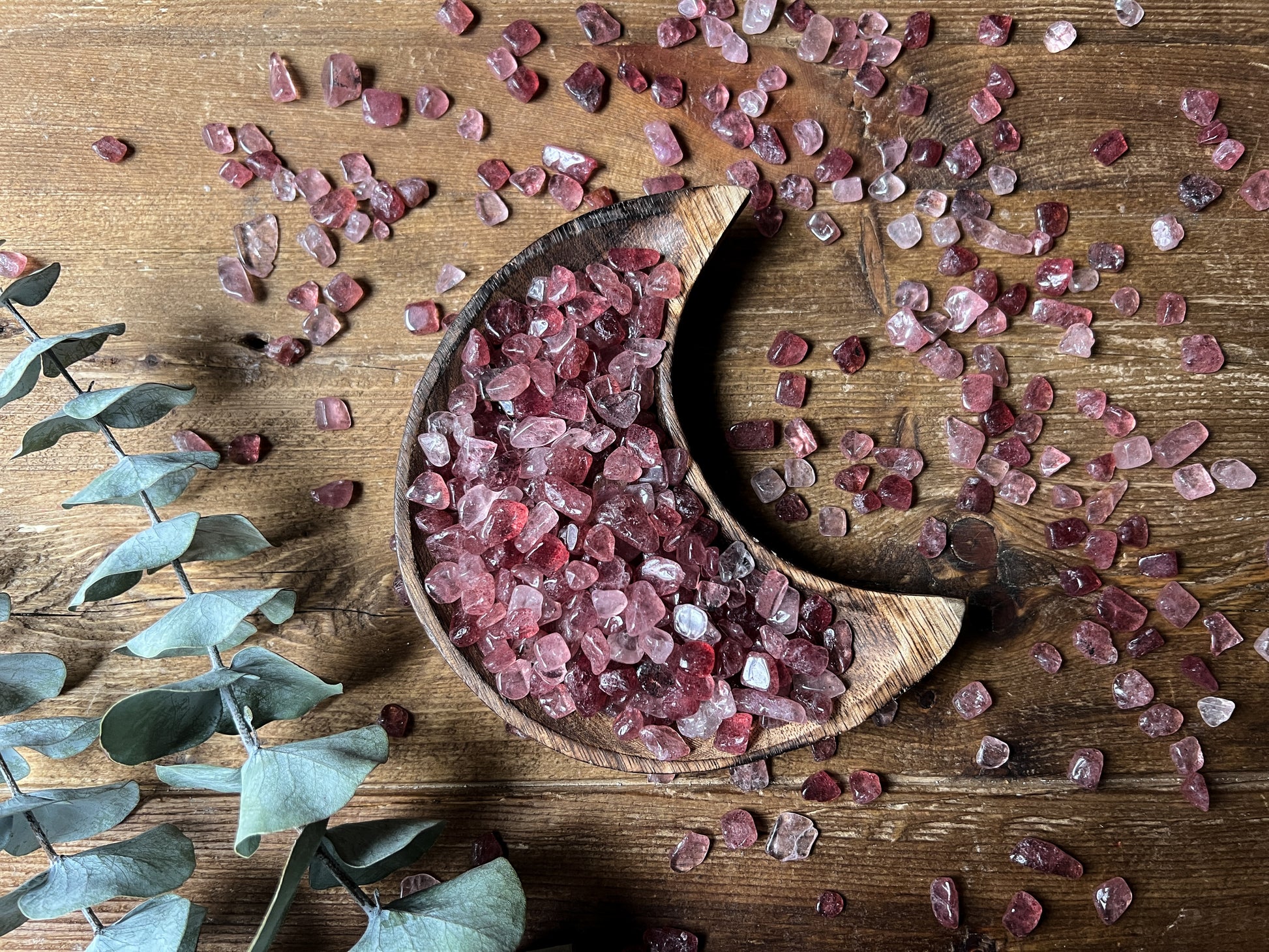 Strawberry Quartz Chips displayed in a moon dish by The Stone Maidens 