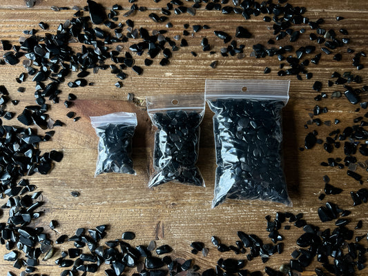 These Black Obsidian Crystal Chips are great for candle making, crafts, resin jewelry, or to place in jars upon your altar. You could even scatter these Chips in your terrariums!