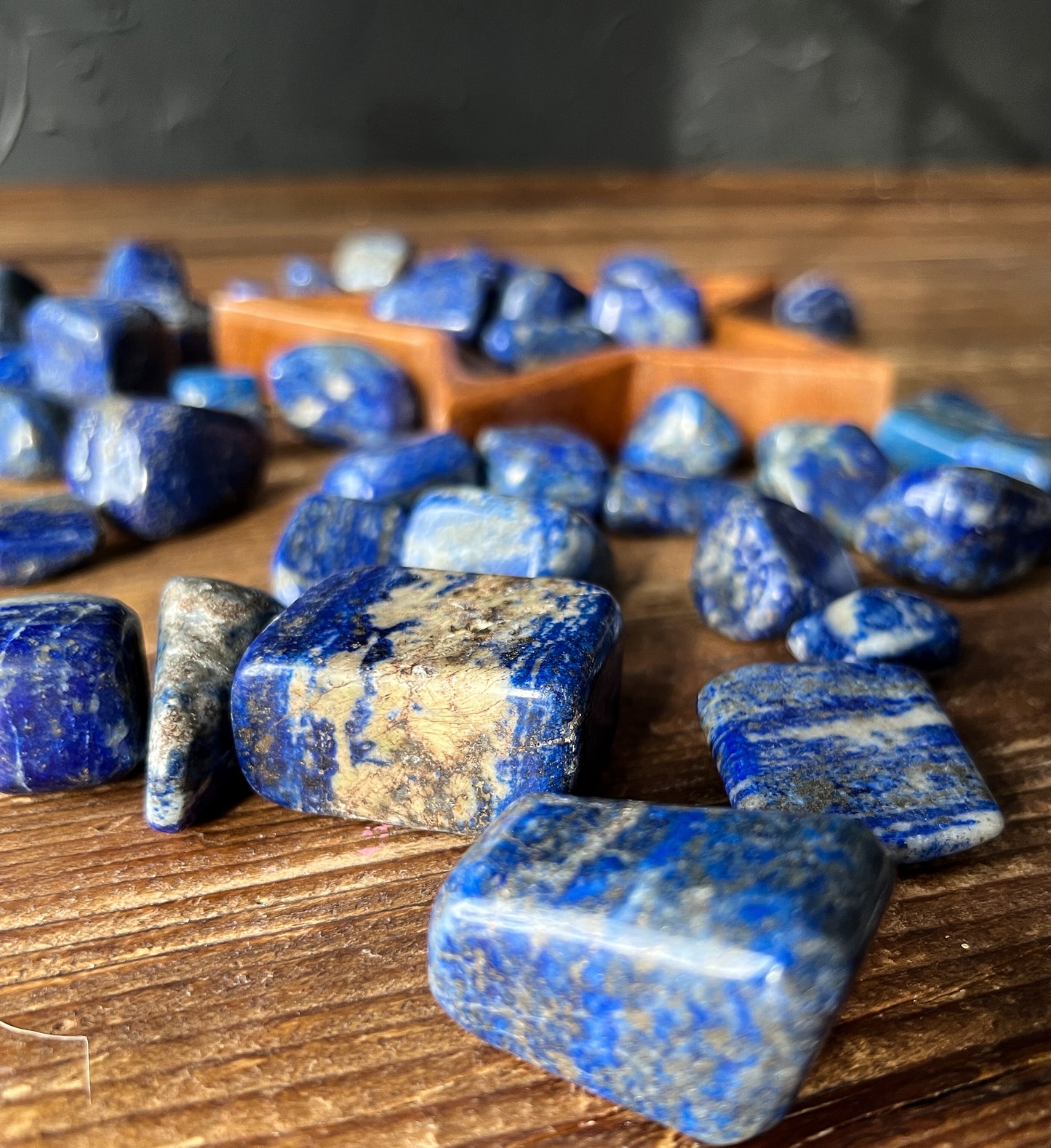 a close up shot of beautiful Lapis Lazuli Tumbled Stones