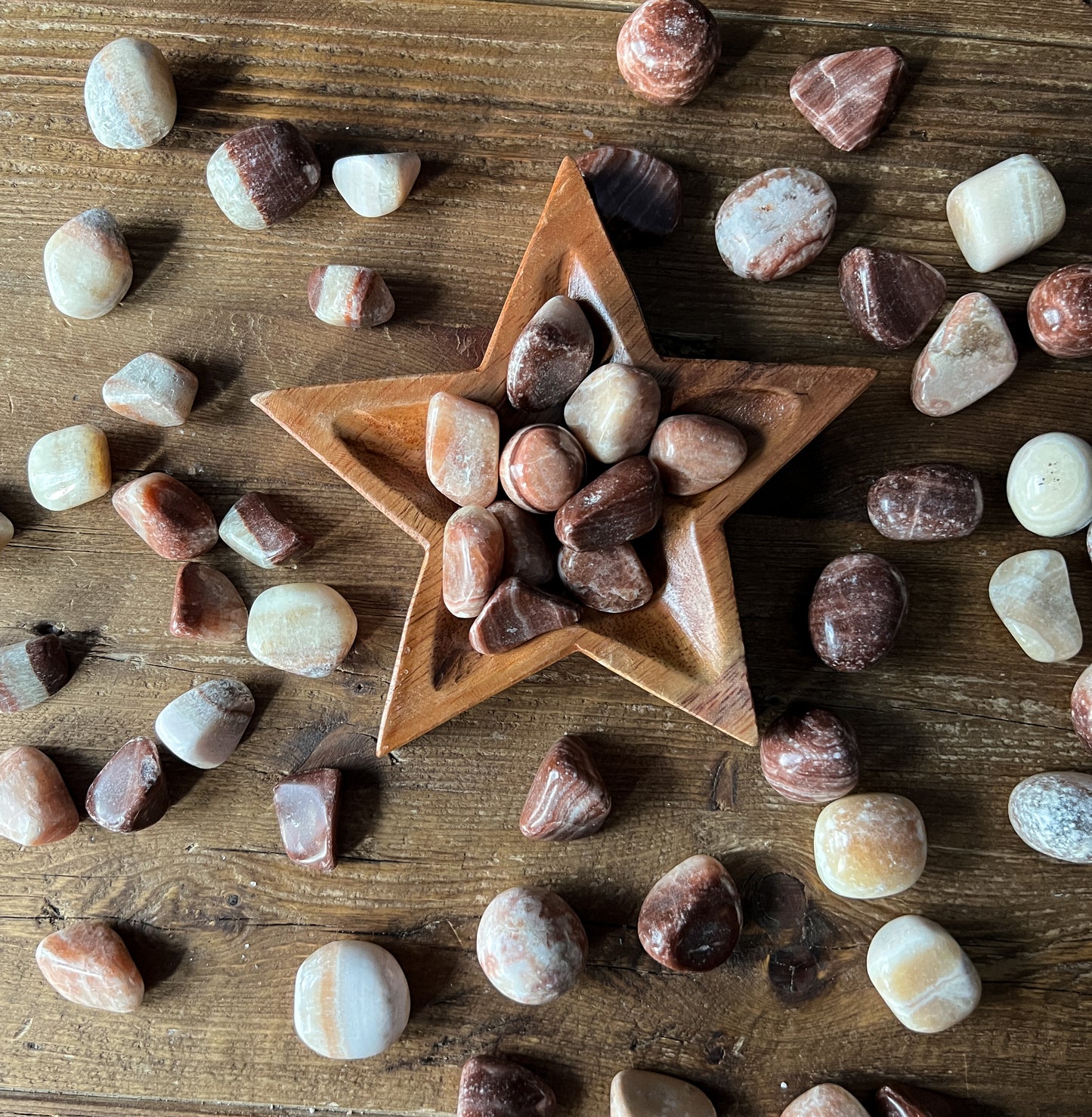 Red Aragonite Tumbled Stones. Polished Red Aragonite Crystals. Shop Metaphysical Crystals and Stones for Sacral and Root Chakra at The Stone Maidens